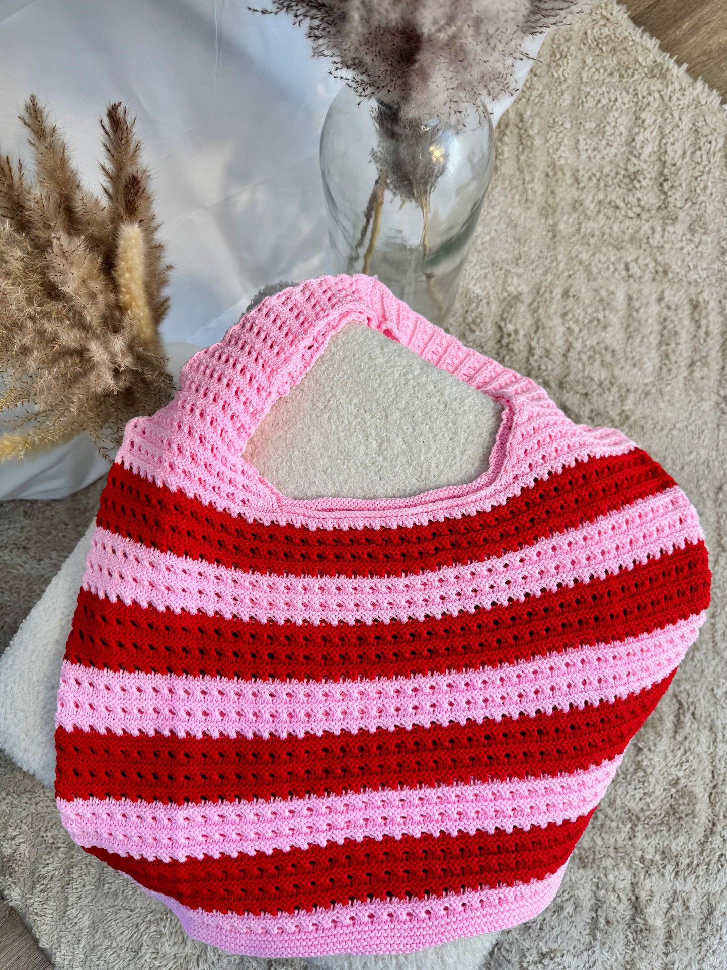 Sac en tricot rose et rouge